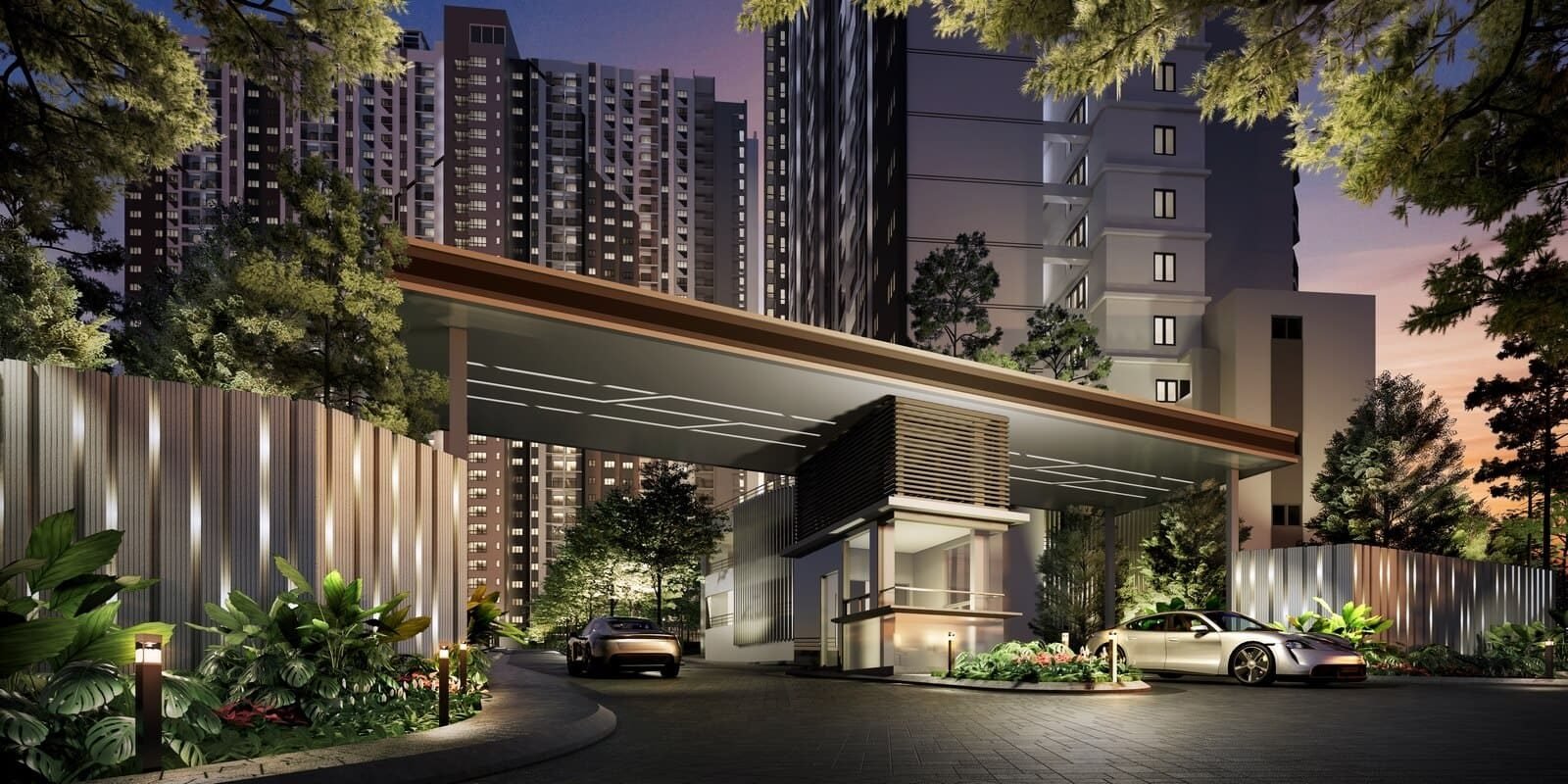 Aster Hill Sri Petaling arrival drop-off illuminated at dusk with the towers behind