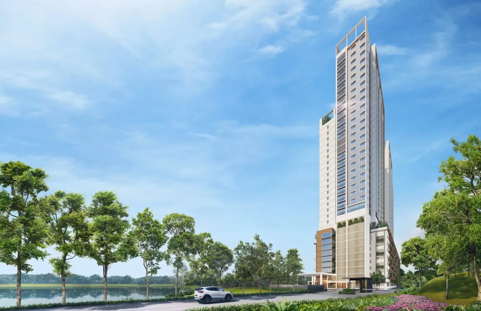 Danau Puchong tower viewed across the lake with surrounding greenery