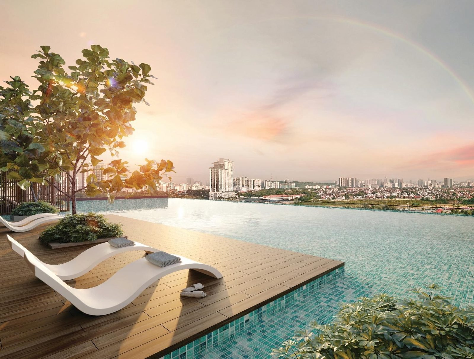 OAKA Residences infinity pool at sunset