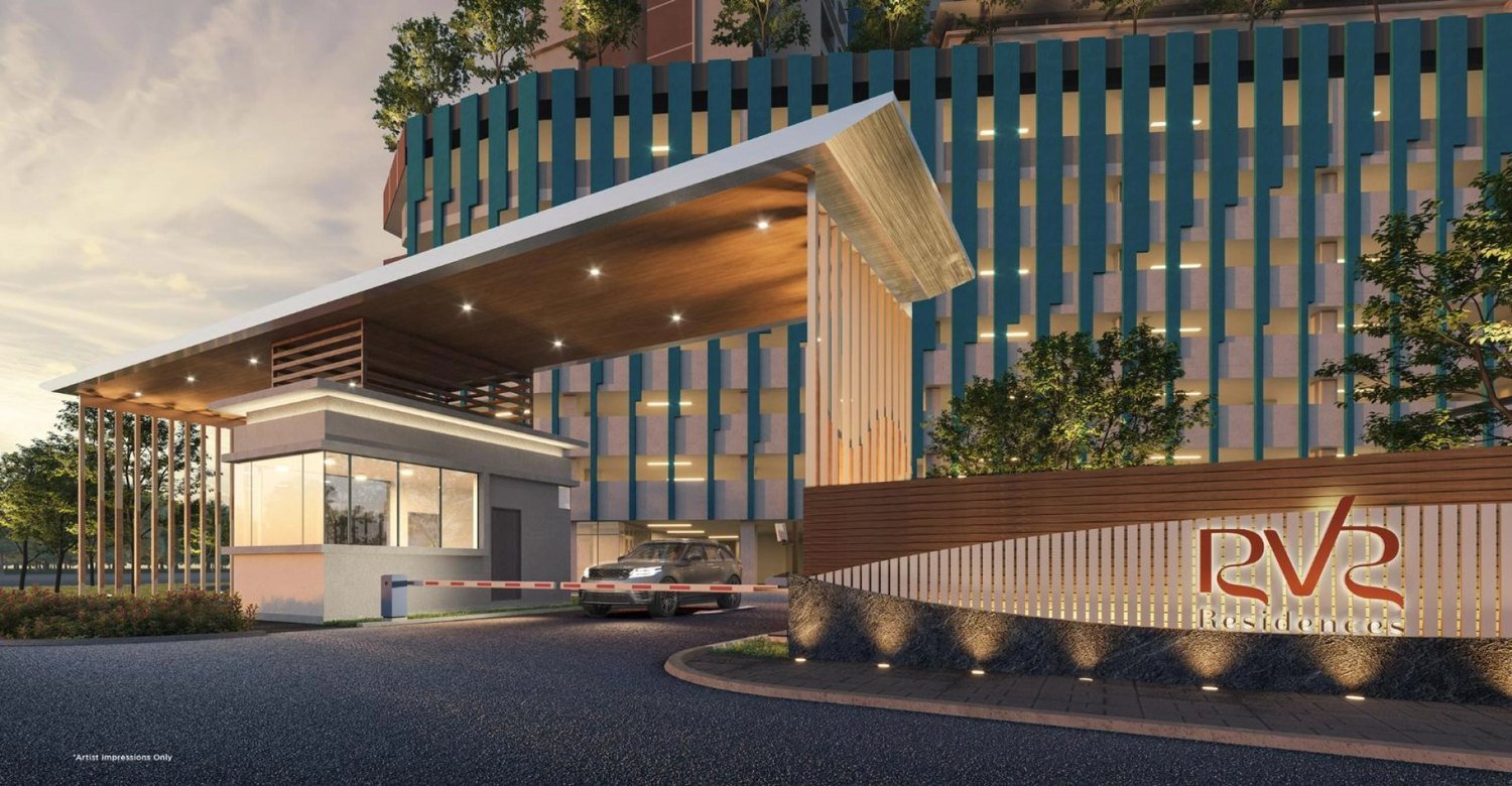 Riverville 2 Residences grand entrance and arrival with the RV2 signage at dusk