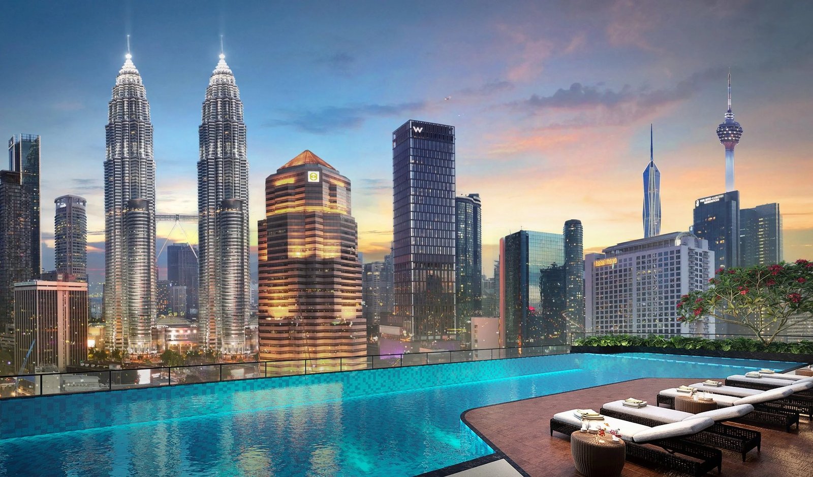 Sutera Suites KL City Gateway infinity pool with KLCC skyline view at dusk